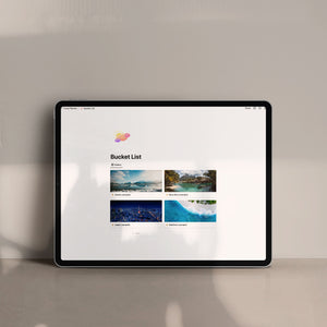 This shows a view in the notion trip planner for bucket list icons. You see an icon with a rainbow cloud followed by a header that says Bucket List. You then see four images in the gallery view of Alaska, Bora Bora, Japan, and Maldives.